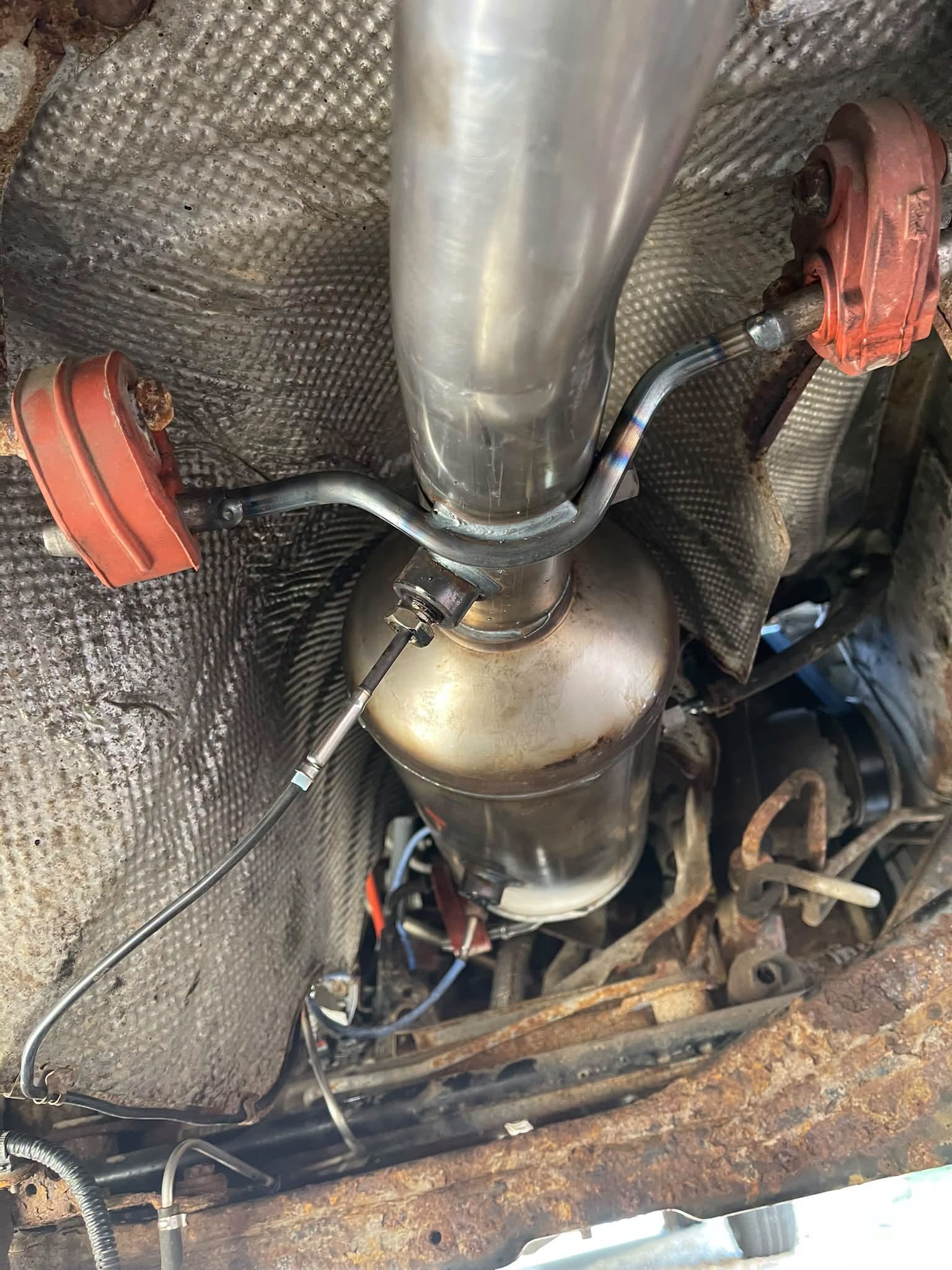 Exhaust work underneath a car